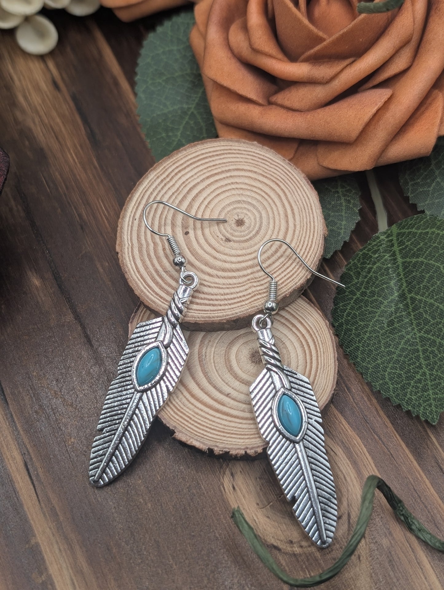 Feather drop earrings