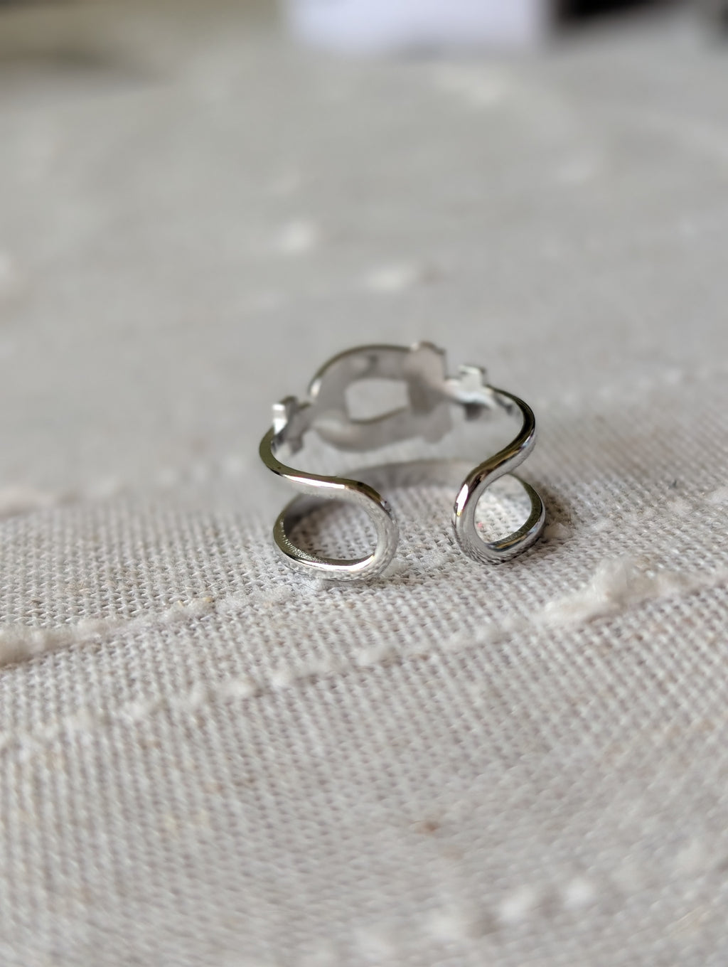 Double buckle open ring