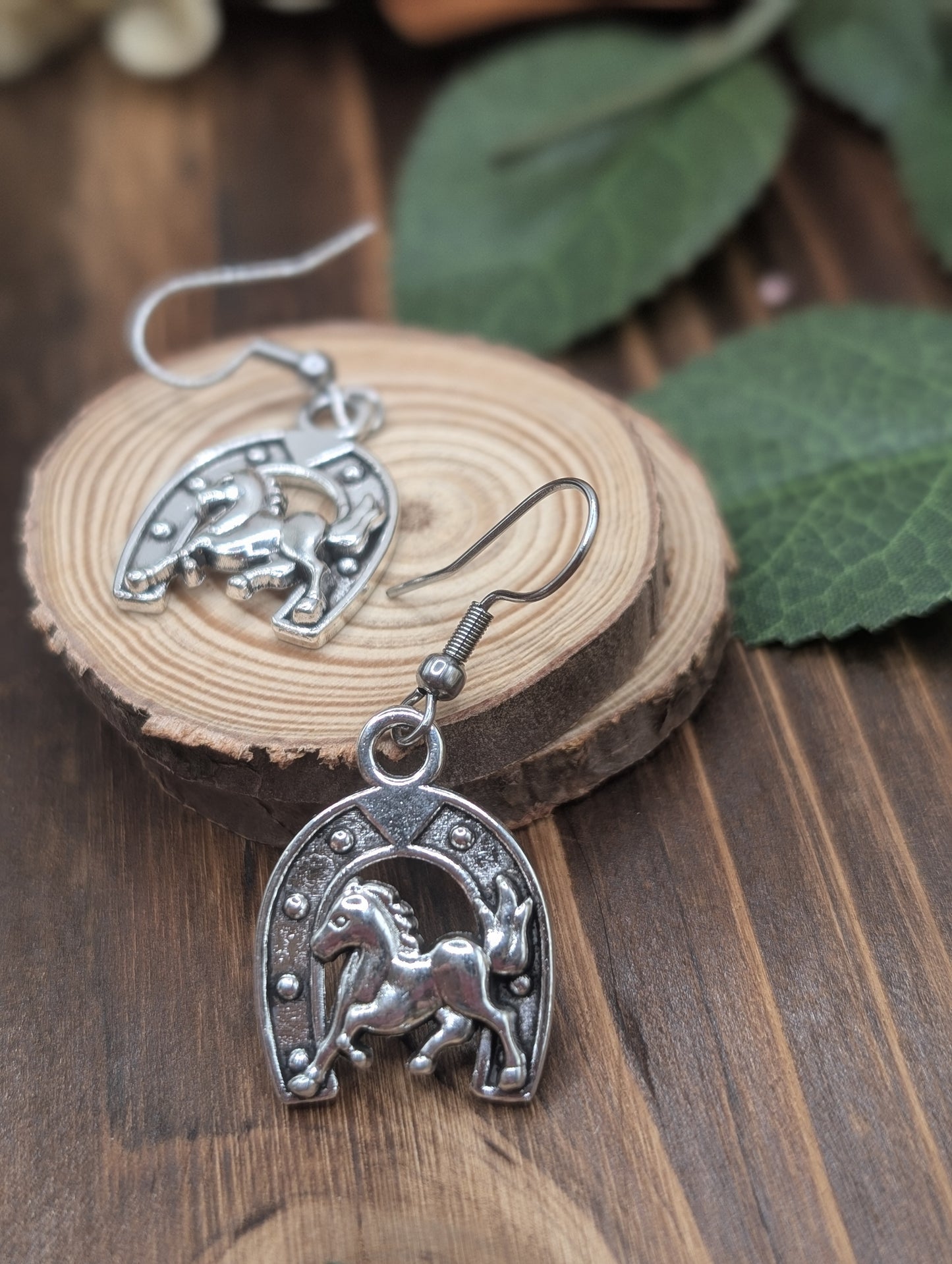 Horseshoe drop earrings