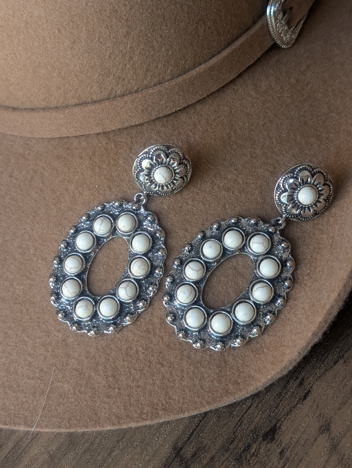 White oval drop earrings