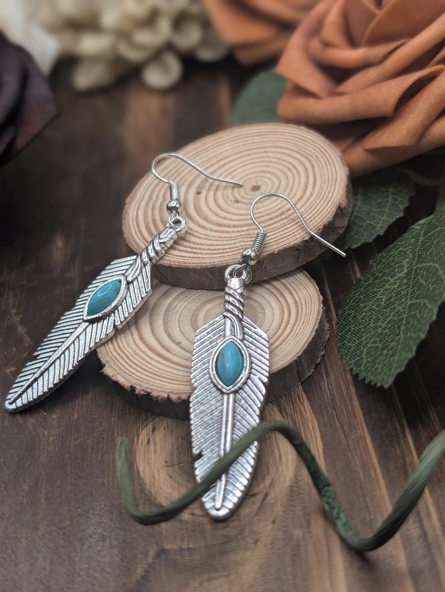 Feather drop earrings