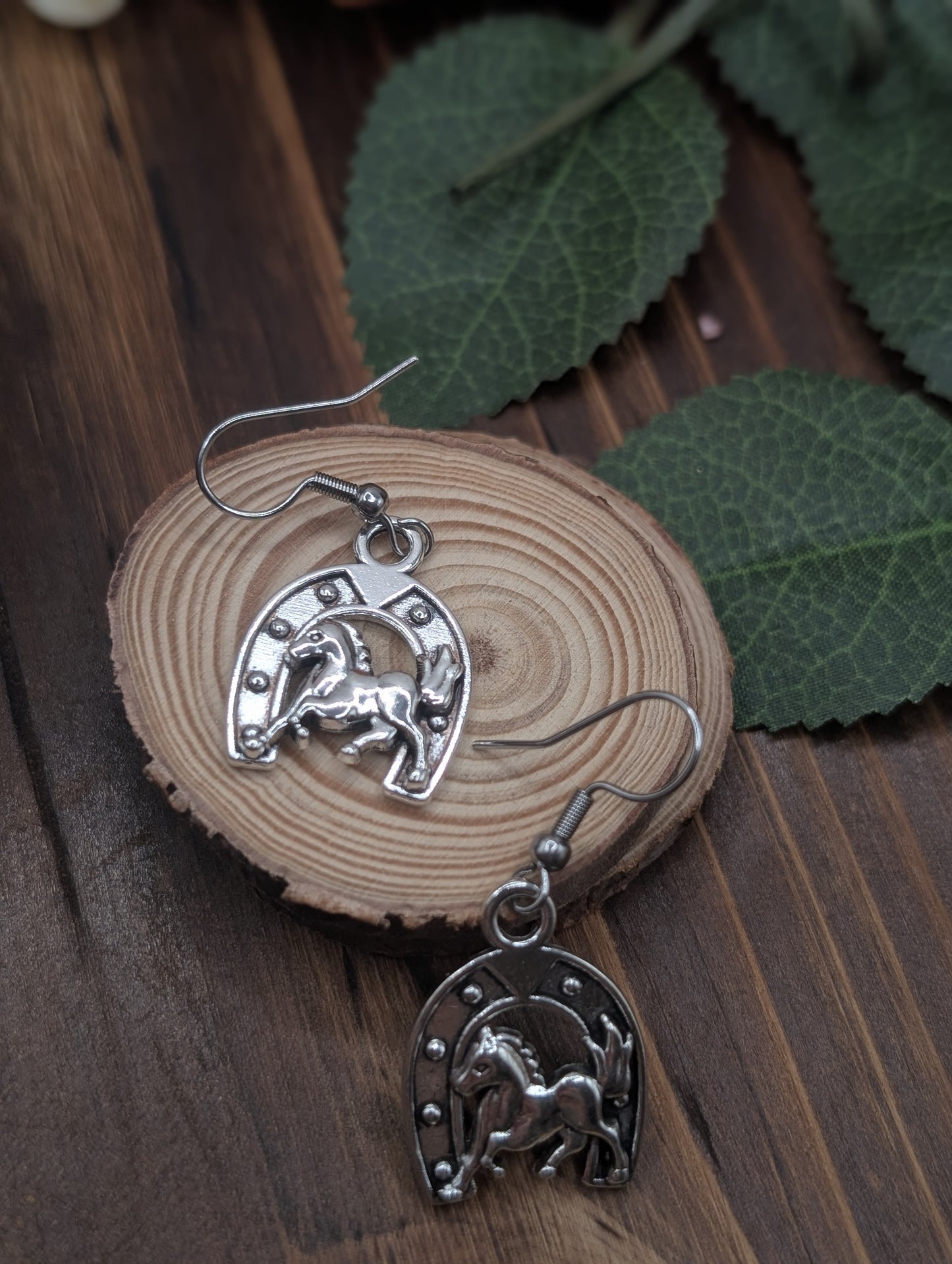 Horseshoe drop earrings