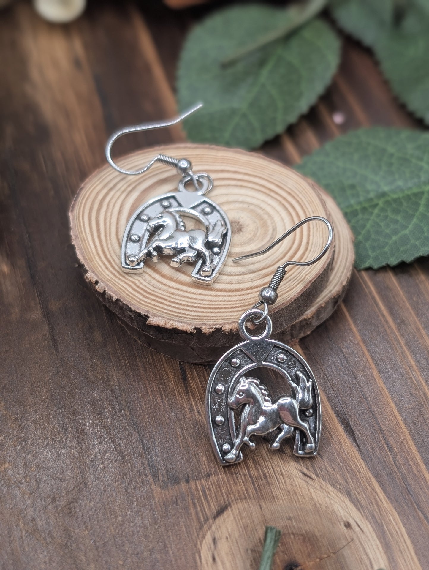 Horseshoe drop earrings