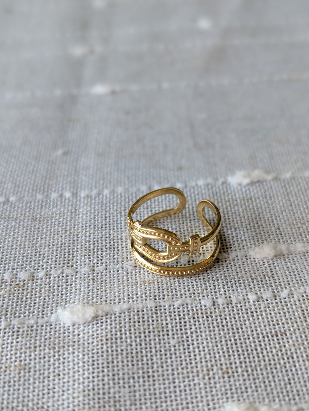 Double buckle open ring
