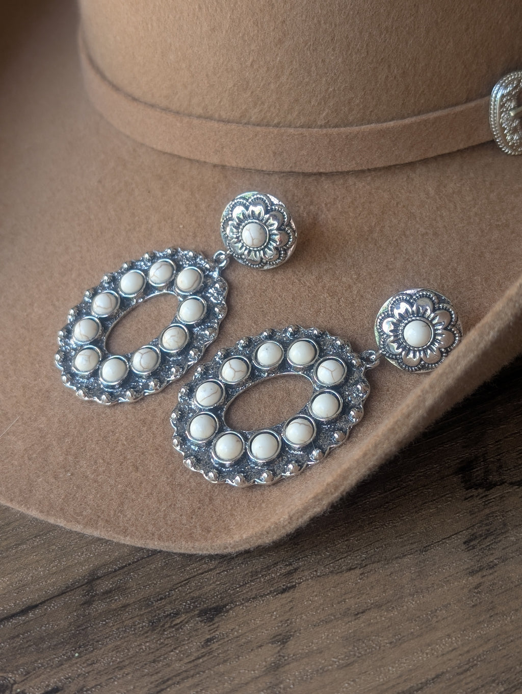 White oval drop earrings